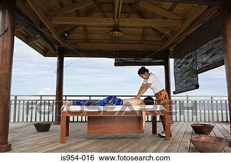 Stock Photograph - Woman having massage. Fotosearch