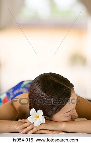 Stock Photography - Woman lying on massage table. Fotosearch