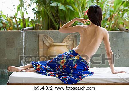 Woman on massage bed View Large Photo Image Stock Image - Woman on massage bed. Fotosearch