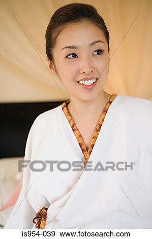 Stock Photo - Young woman smiling. Fotosearch