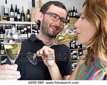 Couple drinking white wine View Large Photo Image Picture - Couple drinking white wine. Fotosearch