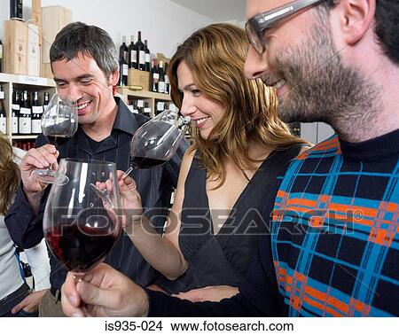 Picture - Group of friends at wine tasting. Fotosearch