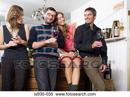 Group of friends at wine tasting View Large Photo Image Stock Photography - Group of friends at wine tasting. Fotosearch