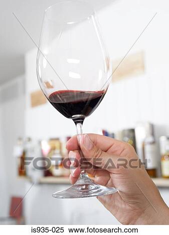 Hand holding wine glass View Large Photo Image Stock Photography - Hand holding wine glass. Fotosearch