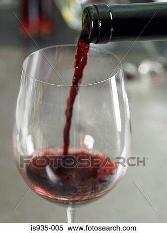 Pouring red wine into glass View Large Photo Image Stock Photography - Pouring red wine into glass. Fotosearch