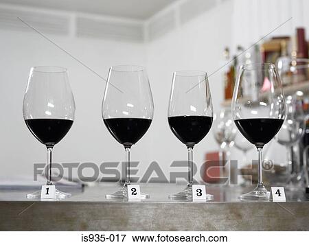 Row of wine glasses View Large Photo Image Stock Photo - Row of wine glasses. Fotosearch