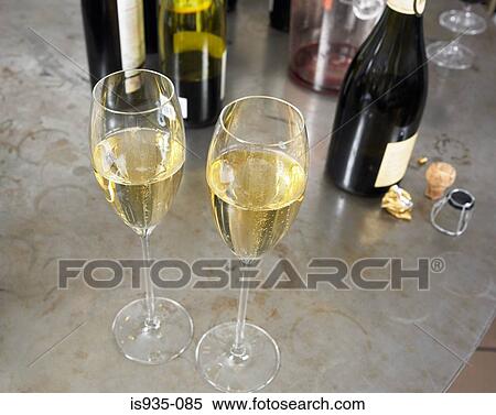 Two glasses of white wine View Large Photo Image Stock Photography - Two glasses of white wine. Fotosearch