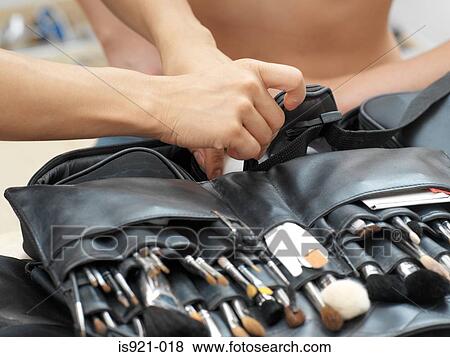 Make up artist with brushes View Large Photo Image Stock Photo - Make up artist with brushes. Fotosearch
