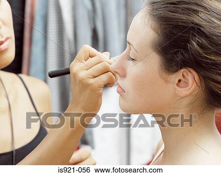 Model having make-up applied View Large Photo Image Stock Photograph - Model having make-up applied. Fotosearch