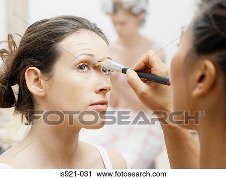 Model having make-up done View Large Photo Image Stock Image - Model having make-up done. Fotosearch
