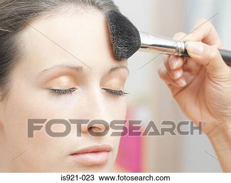 Model having powder applied View Large Photo Image Stock Image - Model having powder applied. Fotosearch
