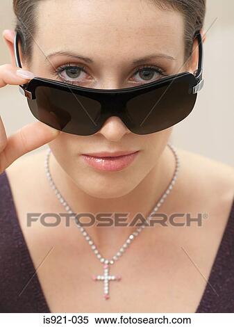 Woman wearing sunglasses View Large Photo Image Stock Photography - Woman wearing sunglasses. Fotosearch