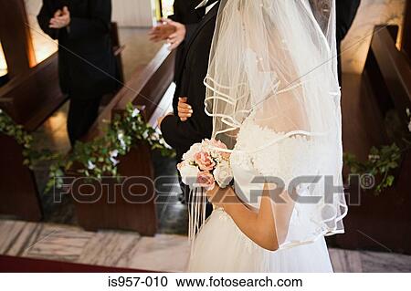 Bride and groom in church View Large Photo Image Stock Image - Bride and groom in church. Fotosearch