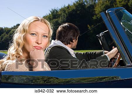 Couple in convertible View Large Photo Image Stock Image - Couple in convertible. Fotosearch
