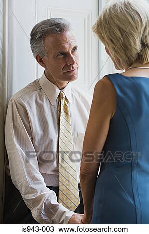 Couple gazing at each other View Large Photo Image Stock Image - Couple gazing at each other. Fotosearch