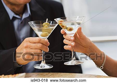 Couple with martinis View Large Photo Image Stock Photo - Couple with martinis. Fotosearch