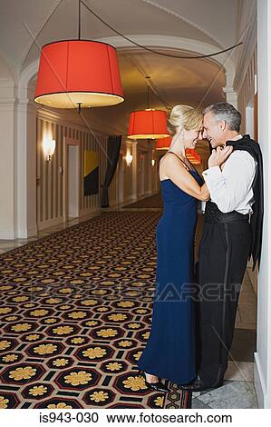 Elegant couple in corridor View Large Photo Image Stock Image - Elegant couple in corridor. Fotosearch