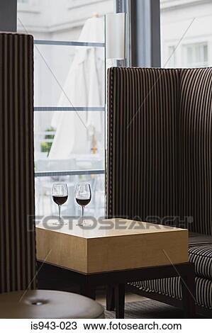 Glasses of wine on a table View Large Photo Image Stock Image - Glasses of wine on a table. Fotosearch