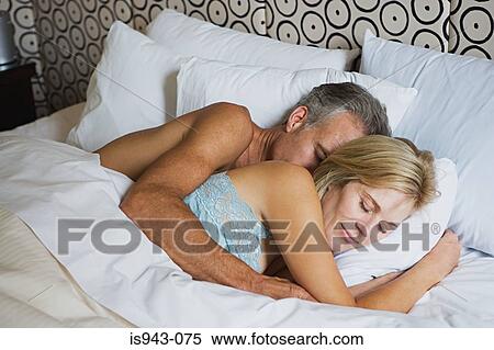 Loving couple sleeping View Large Photo Image Stock Photography - Loving couple sleeping. Fotosearch