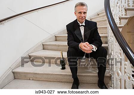 Man in tuxedo with champagne View Large Photo Image Stock Photo - Man in tuxedo with champagne. Fotosearch