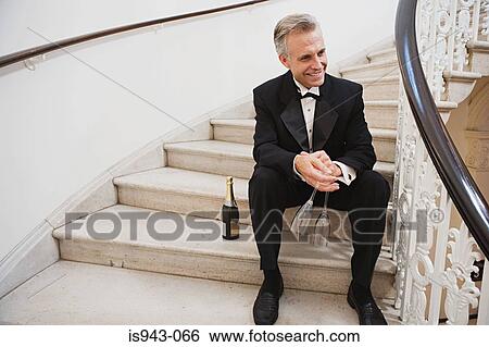 Man in tuxedo with champagne View Large Photo Image Stock Photograph - Man in tuxedo with champagne. Fotosearch