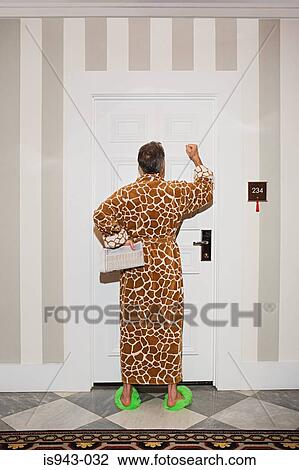 Man knocking on hotel room door View Large Photo Image Stock Image - Man knocking on hotel room door. Fotosearch