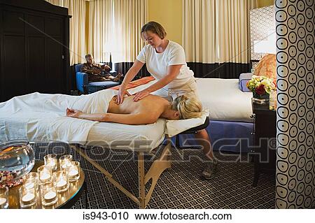 Woman having a massage View Large Photo Image Stock Image - Woman having a massage. Fotosearch