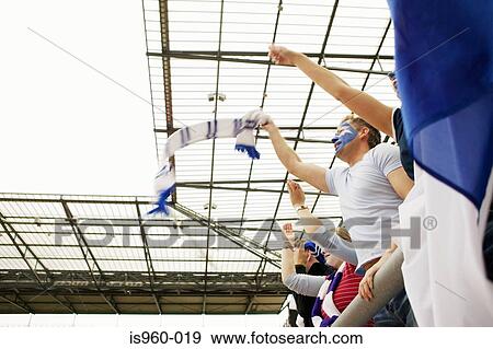 Football crowd waving scarves View Large Photo Image Stock Photo - Football crowd waving scarves. Fotosearch
