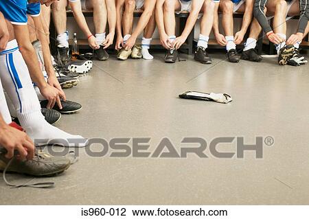 Football team tying laces View Large Photo Image Stock Image - Football team tying laces. Fotosearch