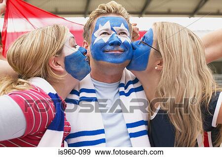 Footballer supporters kissing View Large Photo Image Stock Photo - Footballer supporters kissing. Fotosearch