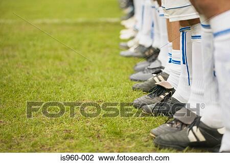 Stock Image - Footballers in line. Fotosearch