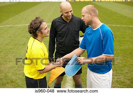 Footballers shaking hands View Large Photo Image Stock Photo - Footballers shaking hands. Fotosearch
