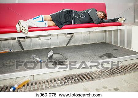 Goalkeeper asleep on the bench View Large Photo Image Stock Photograph - Goalkeeper asleep on the bench. Fotosearch