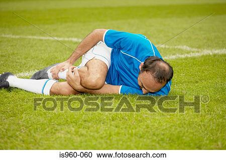 Injured footballer View Large Photo Image Stock Image - Injured footballer. Fotosearch