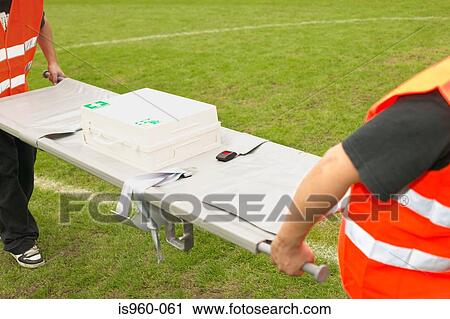 Stretcher carriers View Large Photo Image Stock Image - Stretcher carriers. Fotosearch