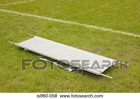 Stretcher on football pitch View Large Photo Image Stock Photo - Stretcher on football pitch. Fotosearch