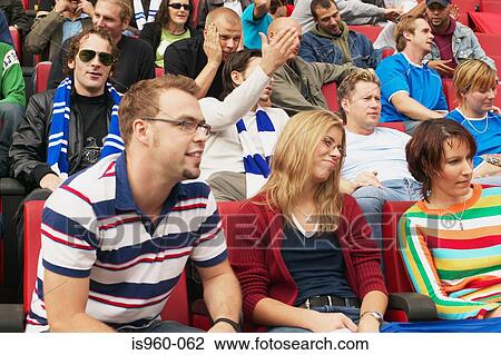 Stock Image - Subdued football supporters. Fotosearch