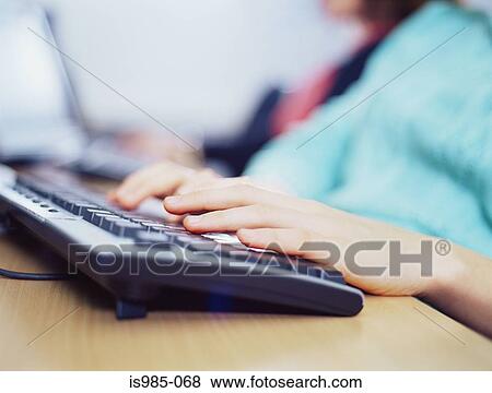 Stock Photo - Girl using computer. Fotosearch