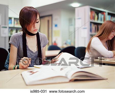 Stock Image - Girls studying. Fotosearch