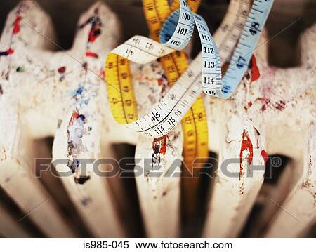 Tape measure on a radiator View Large Photo Image Stock Photography - Tape measure on a radiator. Fotosearch