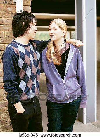 Teenage couple View Large Photo Image Stock Photograph - Teenage couple. Fotosearch