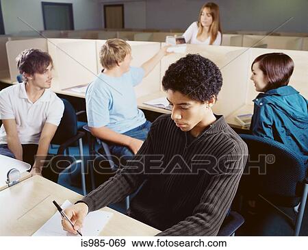 Teenagers studying and chatting View Large Photo Image Stock Photo - Teenagers studying and chatting. Fotosearch
