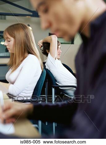 Stock Photography - Teenagers studying. Fotosearch