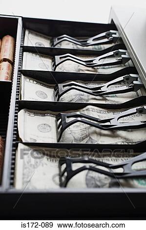 Stock Photo - Banknotes in a cash register. Fotosearch