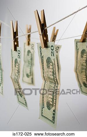 Stock Photography - Banknotes on a clothesline. Fotosearch
