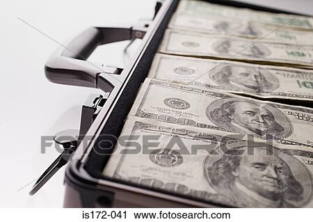 Stock Image - Briefcase full of money. Fotosearch
