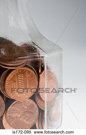 Decanter of one cent coins View Large Photo Image Stock Photography - Decanter of one cent coins. Fotosearch