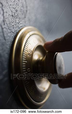 Person opening a security safe View Large Photo Image Stock Photograph - Person opening a security safe. Fotosearch