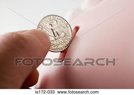 Stock Image - Saving a quarter. Fotosearch