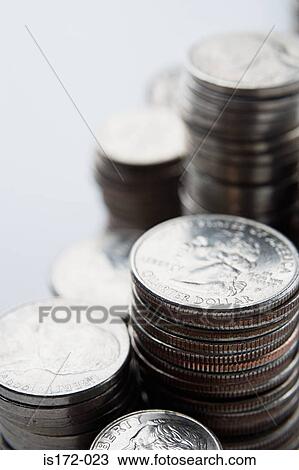 Stock Image - Stacks of US coins. Fotosearch